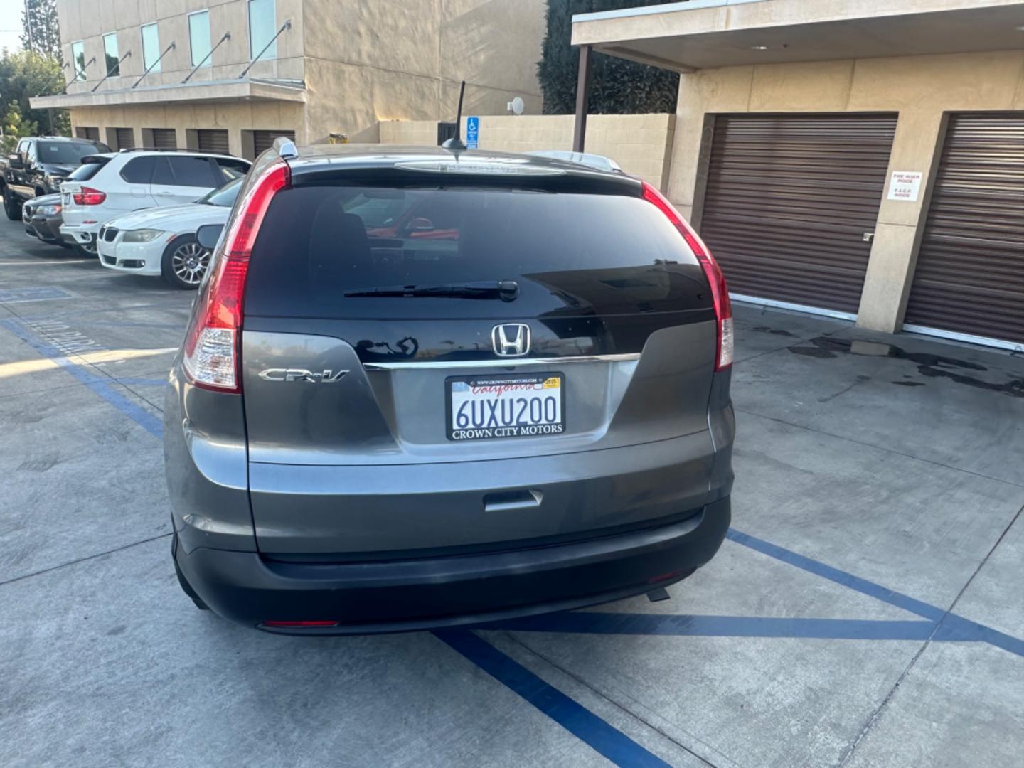 2012 Grey /Gray Honda CR-V EX-L 2WD 5-Speed AT (JHLRM3H78CC) with an 2.4L L4 DOHC 16V engine, 5-Speed Automatic transmission, located at 30 S. Berkeley Avenue, Pasadena, CA, 91107, (626) 248-7567, 34.145447, -118.109398 - Moon-roof! Leather seats! This 2012 Honda CR-V EX-L 2WD 5-Speed AT looks and drives good. - Photo#3